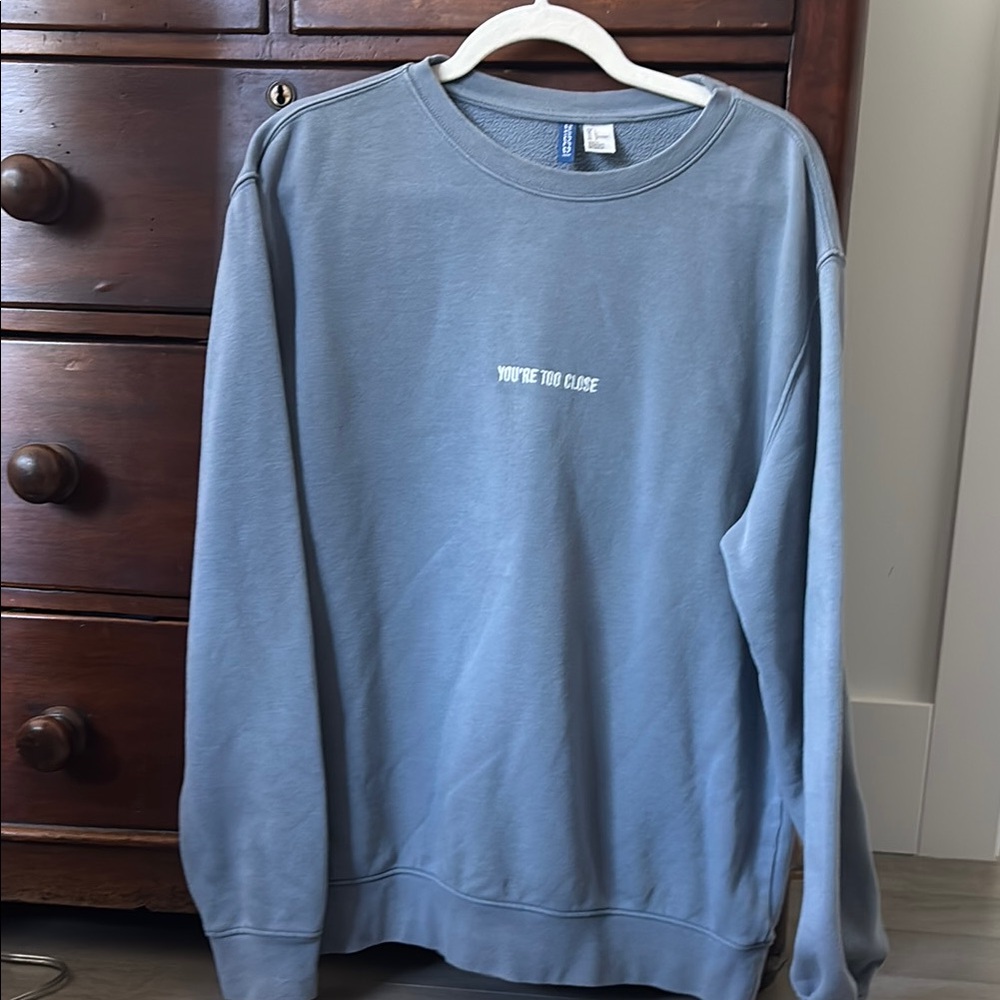 Divided Light Blue Crewneck Sweater